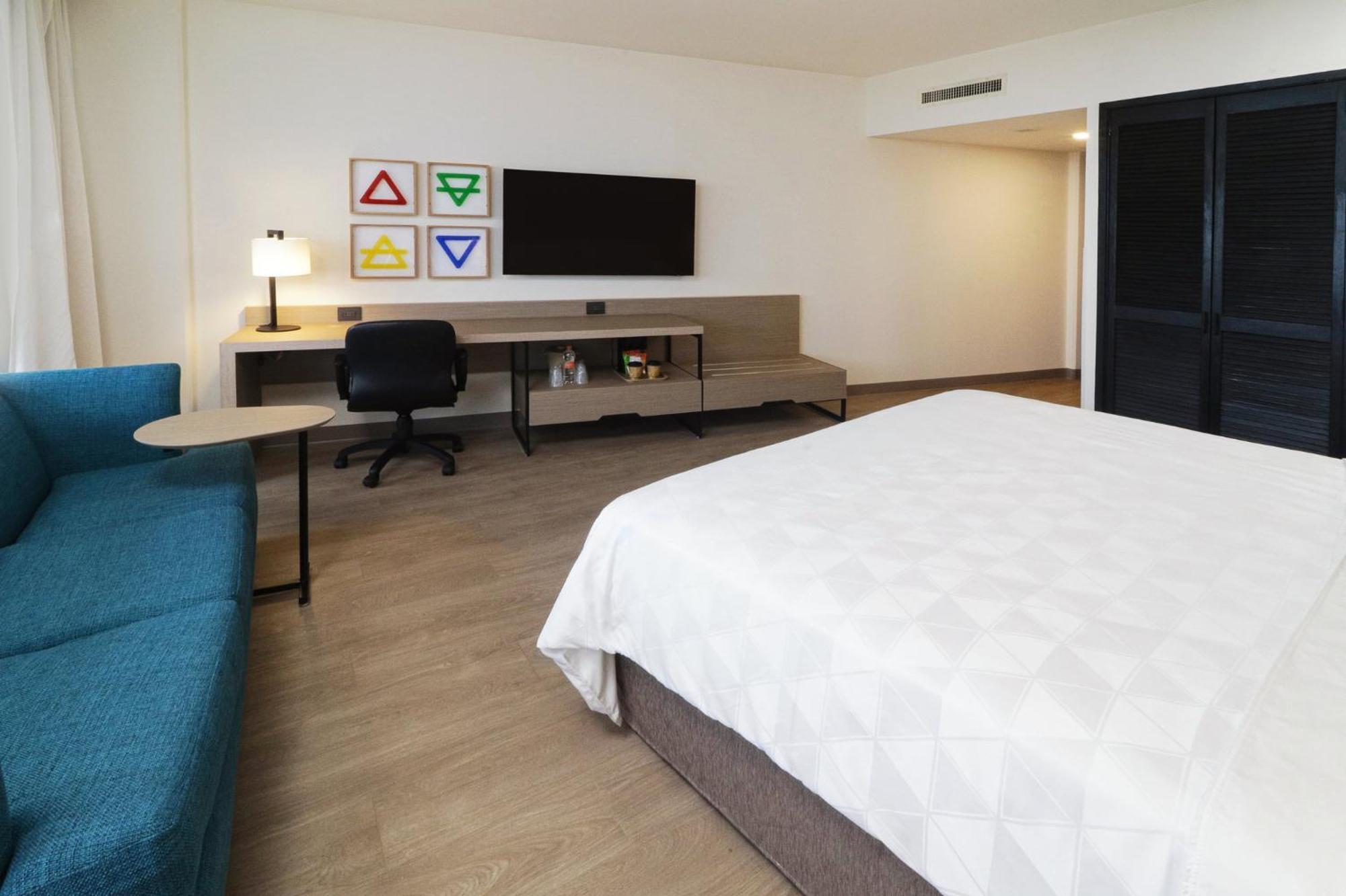 Holiday Inn Monterrey-Parque Fundidora By Ihg Buitenkant foto A room at the Hilton Garden Inn